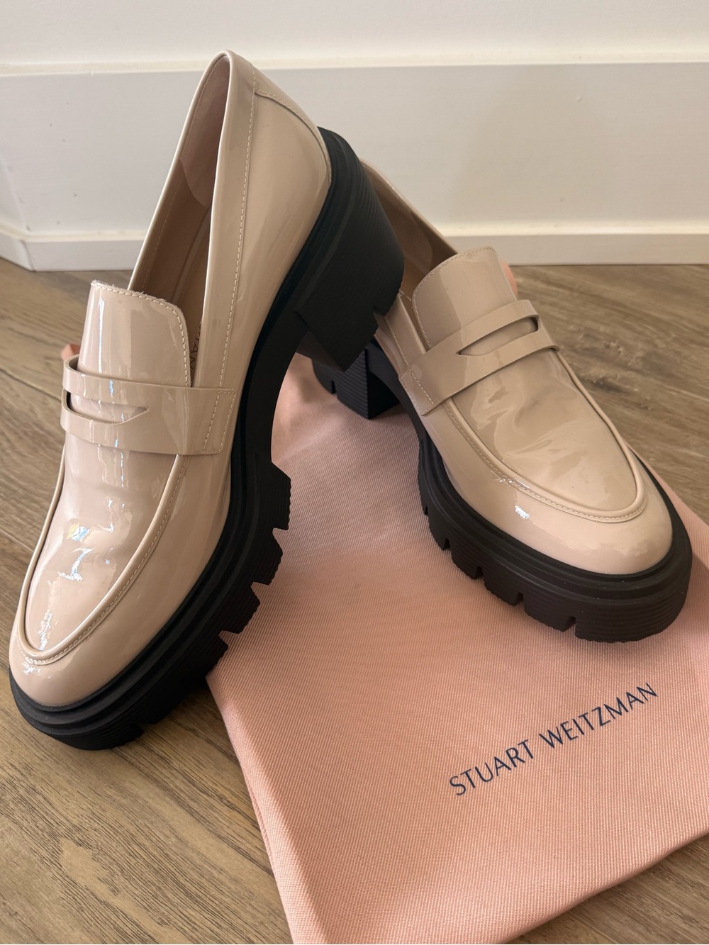 Stuart Weitzman Patent Leather Lug Sole Loafers in Nude Patent